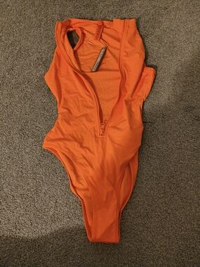 SKIMS Bright Orange One-Piece with Front Zip